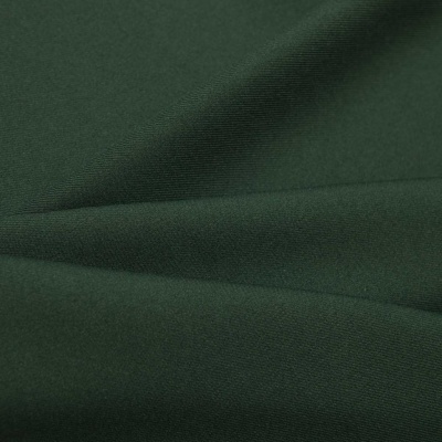 Ткань костюмная 21010 2076, 225 гр/м2, шир.150см, цвет т.зеленый - купить в Новочеркасске. Цена 390.73 руб.